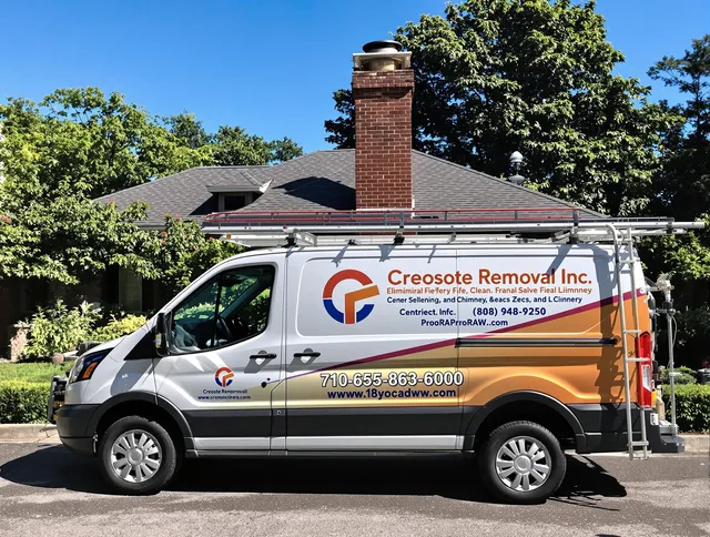 Temescal Valley Chimney Sweep technician removing creosote safely in Temescal Valley, CA